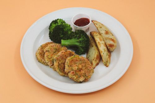  chickpea nuggets with wedges plated with broccoli 